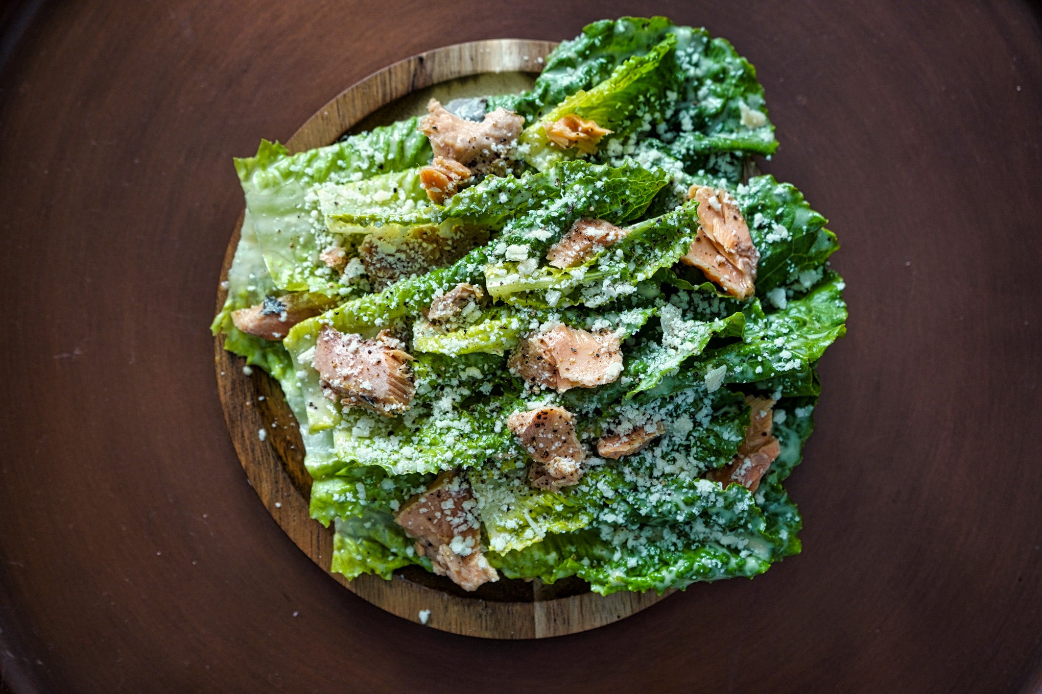 caesar salad with salmon and parmesan