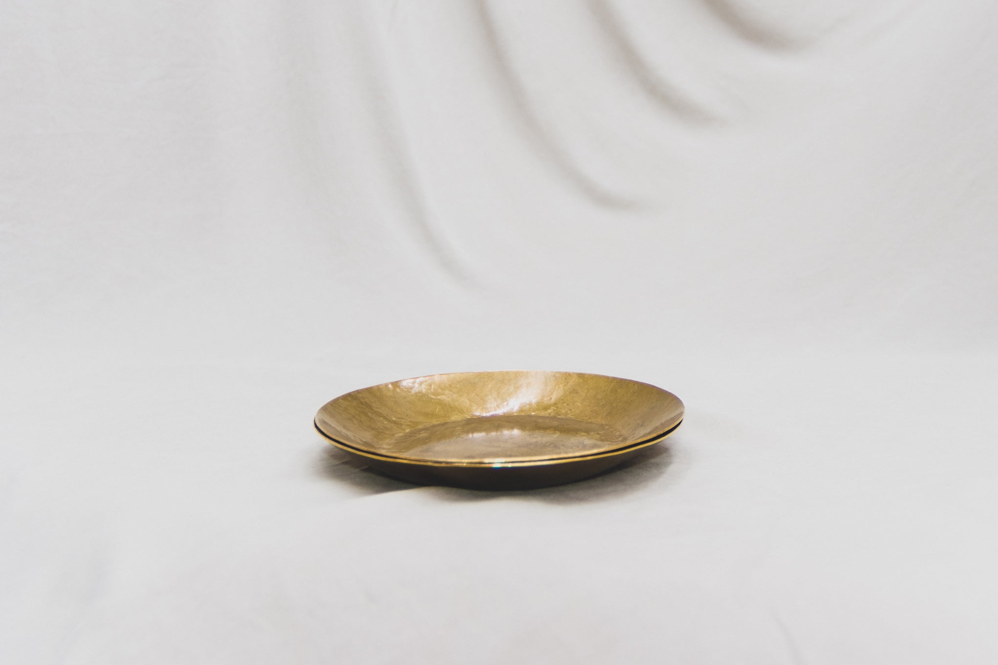 Brass plate on a table 