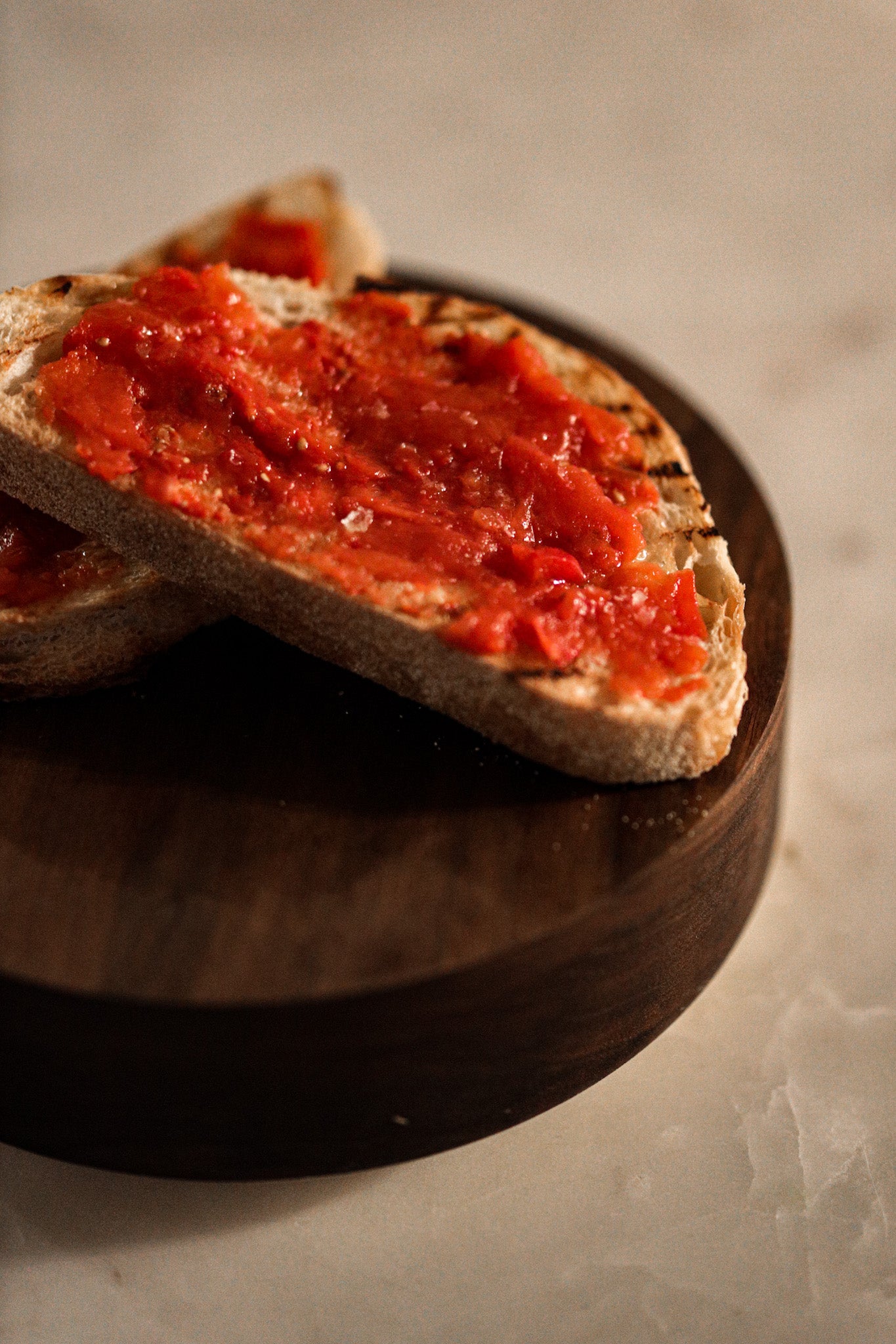 Natural Peeled Tomatoes spread on toasted bread